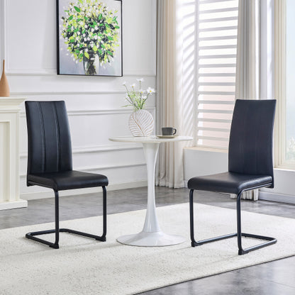 2-Pack PU Upholstered Dining Chairs - Black Modern Kitchen Side Chairs With Sturdy Black Powder-Coated Metal Tube Legs - view 2